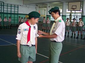 先後出任童軍副團長及團長