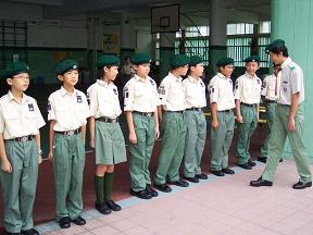 先後出任童軍副團長及團長